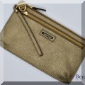 H75. Calvin Klein wristlet - $18 